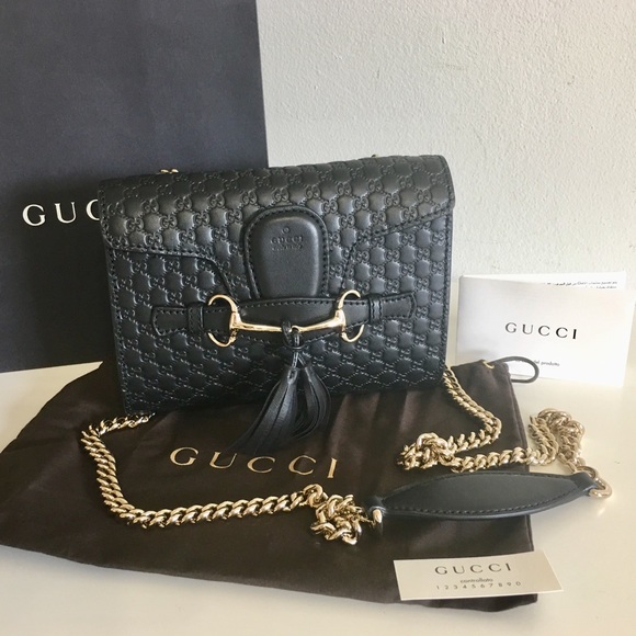 Gucci Handbags - NWT Authentic GAUCCI O BORSA Black Leather bag